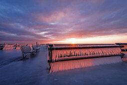 Dahme pier with icicles in the morning light, Baltic Sea, winter, Schleswig-Holstein, Germany