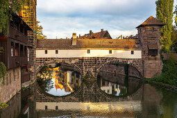 View from Maxbrücke to the Pegnitz (river) and the Henker's Bridge in the evening light, Nuremberg city center, Franconia, Bavaria, Germany