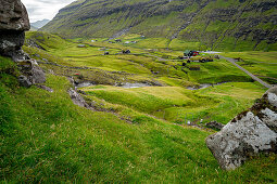 View of the valley with the village of Saksun from a hiking trail to one of the most beautiful places in the world, Saksun, Streymoy Island in the Faroe Islands.