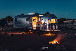 Illuminated Airstream at night in Williams, Flagstaff, Grand Canyon, Arizona, USA, North America