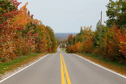 Country road in autumn, Quebec, Canada
