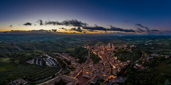 Bird's eye view of sunrise over San Gimignano, Province of Siena, Tuscany, Italy