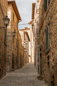 In the narrow streets of Lucignano, Arezzo Province, Tuscany, Italy