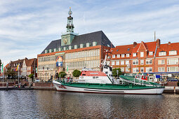 Museum cruiser in the Ratsdelft, harbor, town hall of the city of Emden, town hall, Emden, East Frisia, Lower Saxony, Germany