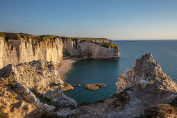 Chalk cliffs cliff at the golden hour near Étretat, Normandy, France.