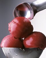 Three Scoops of Raspberry Sorbet in Metal Bowl