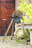 Old grindstone in garden