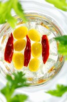 Two different types of chillies in a glass dish