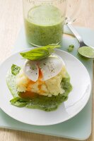 Poached eggs in basil sauce