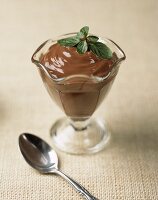 Chocolate Pudding in a Glass Dish with Spoon
