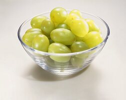 Green Grapes in a Glass Bowl on a White Background