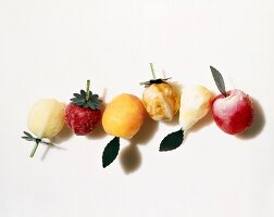 Assorted Frozen Fruit Shapes Popsicles; White Background