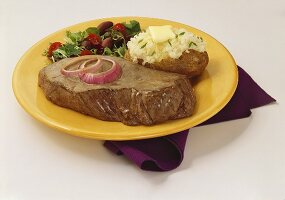 Steak with Baked Potato and Salad