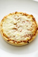 Whole Deep Dish Pizza on a White Background