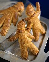 Three Pastry Men on a Metal Tray