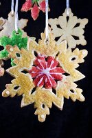 Christmas Snowflake Sugar Cookies Hanging; Black Background