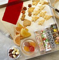 Arrangement of edible decorations and biscuits
