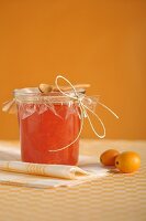 Orange and kumquat marmalade in jam jar