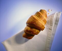 Croissant on a fabric napkin