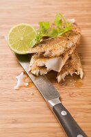 Spicy pangasius fillet with lime and coriander leaves