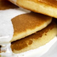 Pancakes with cream, close-up