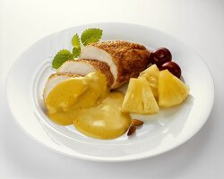 Roasted chicken breast with curry sauce and pineapple