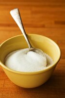 Bowl of sugar with spoon