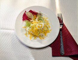 Rice salad with peppers and fennel served on plate