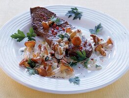 Pfeffersteak m. Kräuterpfifferlingen 