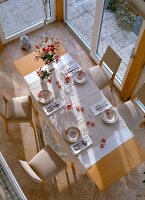 Laid table in conservatory, elevated view