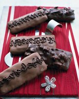 Close-up of gingerbread covered in dark chocolate and milk chocolate