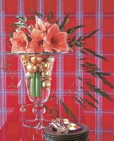 Hard bouquet of amaryllis with Christmas bauble and glass prisms