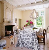 Flair and baroque dining room with table and chairs in country house