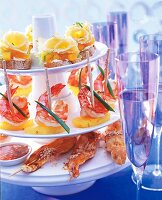 Tete de Moine cheese, shrimp and turkey appetizers on tiered stand