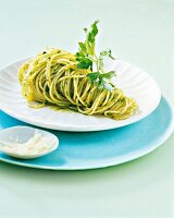 Close-up of spaghetti with parsley pesto on plate