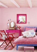 Pink checked carpet and linen on bed in bedroom