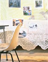 White lace tablecloth with contemporary photographs