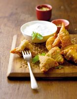 Lamb samosas with yogurt