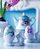 Easter eggs with Toile de Jouy designs on two egg cup