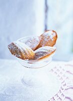 Madeleines with sugar in glass