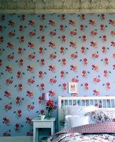 Bedroom with floral pattern wallpaper