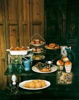 Various yeast dough products on rustic table
