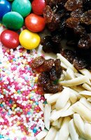 Close-up of raisins and smarties for baking decoration