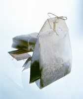 Close-up of tea bag on white background