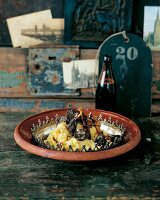 Mashed potatoes with black pudding on plate