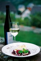 Zwetschgen-Kompott mit Marzipan Mousse und Weißwein