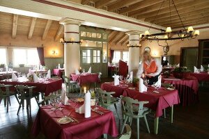 Interior of restaurant with laid tables in Germany