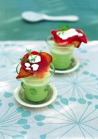 Chilled cucumber soup with mint in glasses