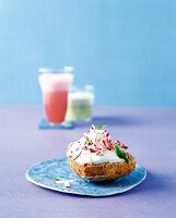 Bread with cream cheese on blue plate