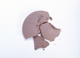 Close-up of muscat coloured eye shadow on white background